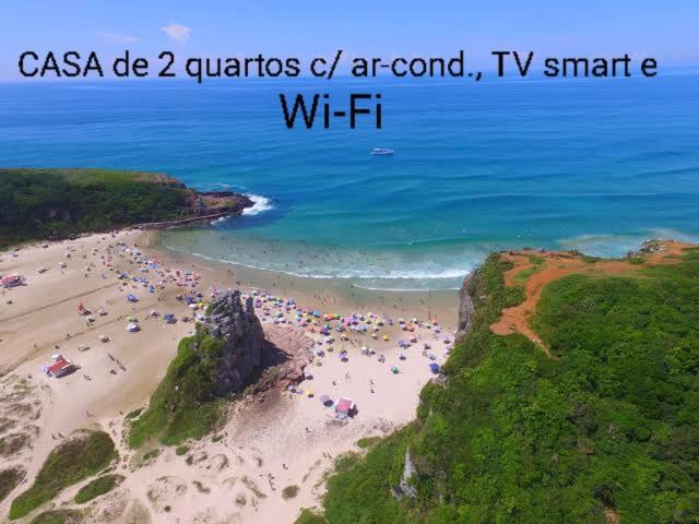 Villa CASA completa em TORRES-RS - O MELHOR CUSTO BENEFICIO na mais bela praia Gaúcha - Cozinha - Banheiro - Ar condicionado - Smart TV 32 Android Apps Youtube - Netflix - Prime Vídeo e Wi-Fi - Estacionamento - Acomoda até 10 pessoas - Anfitriã Superhost n Extérieur photo