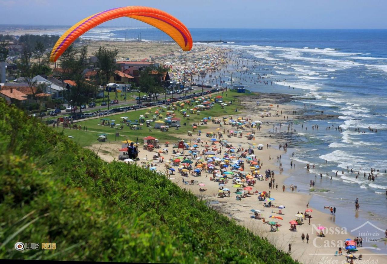 Villa CASA completa em TORRES-RS - O MELHOR CUSTO BENEFICIO na mais bela praia Gaúcha - Cozinha - Banheiro - Ar condicionado - Smart TV 32 Android Apps Youtube - Netflix - Prime Vídeo e Wi-Fi - Estacionamento - Acomoda até 10 pessoas - Anfitriã Superhost n Extérieur photo