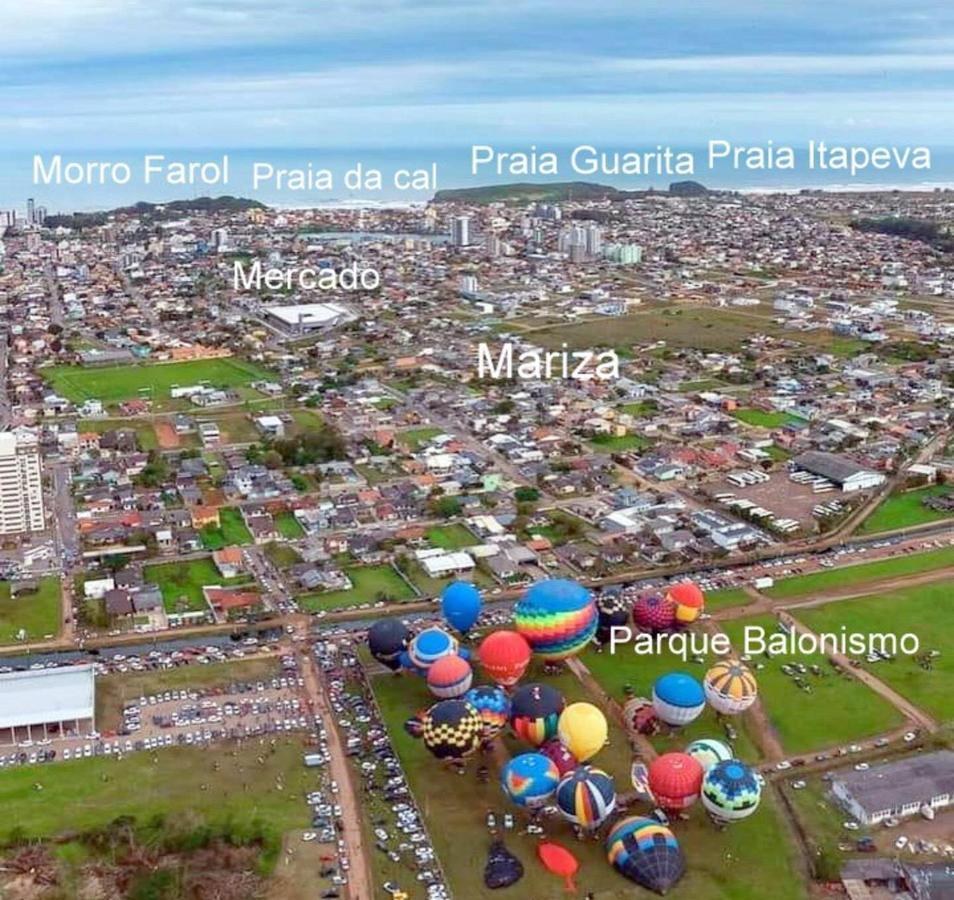 Villa CASA completa em TORRES-RS - O MELHOR CUSTO BENEFICIO na mais bela praia Gaúcha - Cozinha - Banheiro - Ar condicionado - Smart TV 32 Android Apps Youtube - Netflix - Prime Vídeo e Wi-Fi - Estacionamento - Acomoda até 10 pessoas - Anfitriã Superhost n Extérieur photo