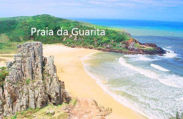 Villa CASA completa em TORRES-RS - O MELHOR CUSTO BENEFICIO na mais bela praia Gaúcha - Cozinha - Banheiro - Ar condicionado - Smart TV 32 Android Apps Youtube - Netflix - Prime Vídeo e Wi-Fi - Estacionamento - Acomoda até 10 pessoas - Anfitriã Superhost n Extérieur photo