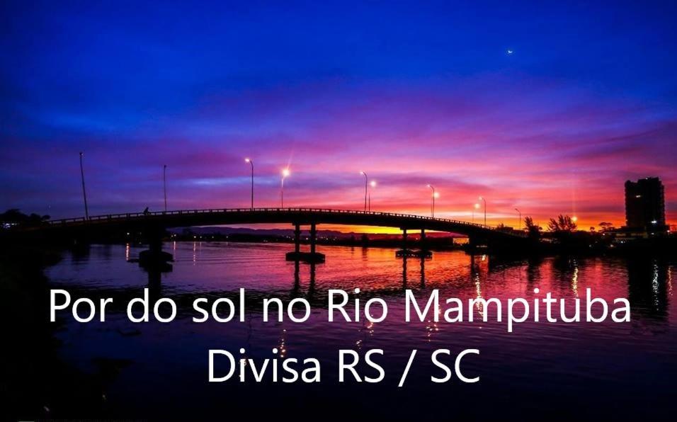Villa CASA completa em TORRES-RS - O MELHOR CUSTO BENEFICIO na mais bela praia Gaúcha - Cozinha - Banheiro - Ar condicionado - Smart TV 32 Android Apps Youtube - Netflix - Prime Vídeo e Wi-Fi - Estacionamento - Acomoda até 10 pessoas - Anfitriã Superhost n Extérieur photo
