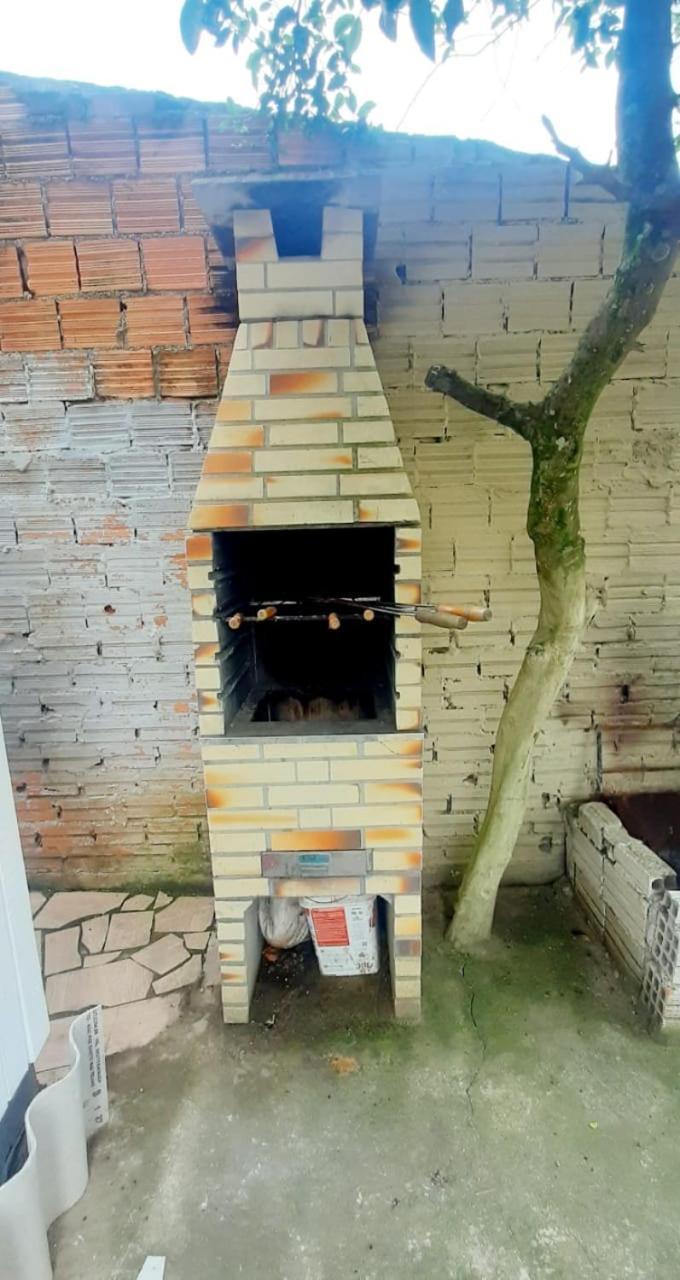 Villa CASA completa em TORRES-RS - O MELHOR CUSTO BENEFICIO na mais bela praia Gaúcha - Cozinha - Banheiro - Ar condicionado - Smart TV 32 Android Apps Youtube - Netflix - Prime Vídeo e Wi-Fi - Estacionamento - Acomoda até 10 pessoas - Anfitriã Superhost n Extérieur photo